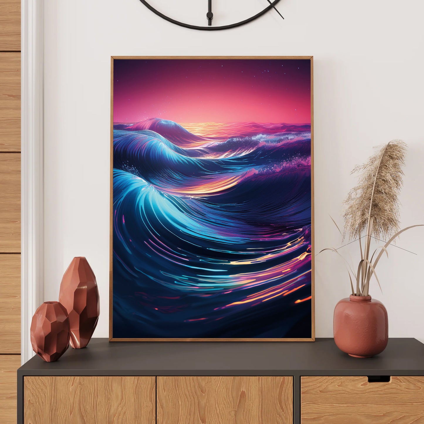 Framed abstract artwork of wavy colors on a wall above a wooden cabinet with decorative items.
