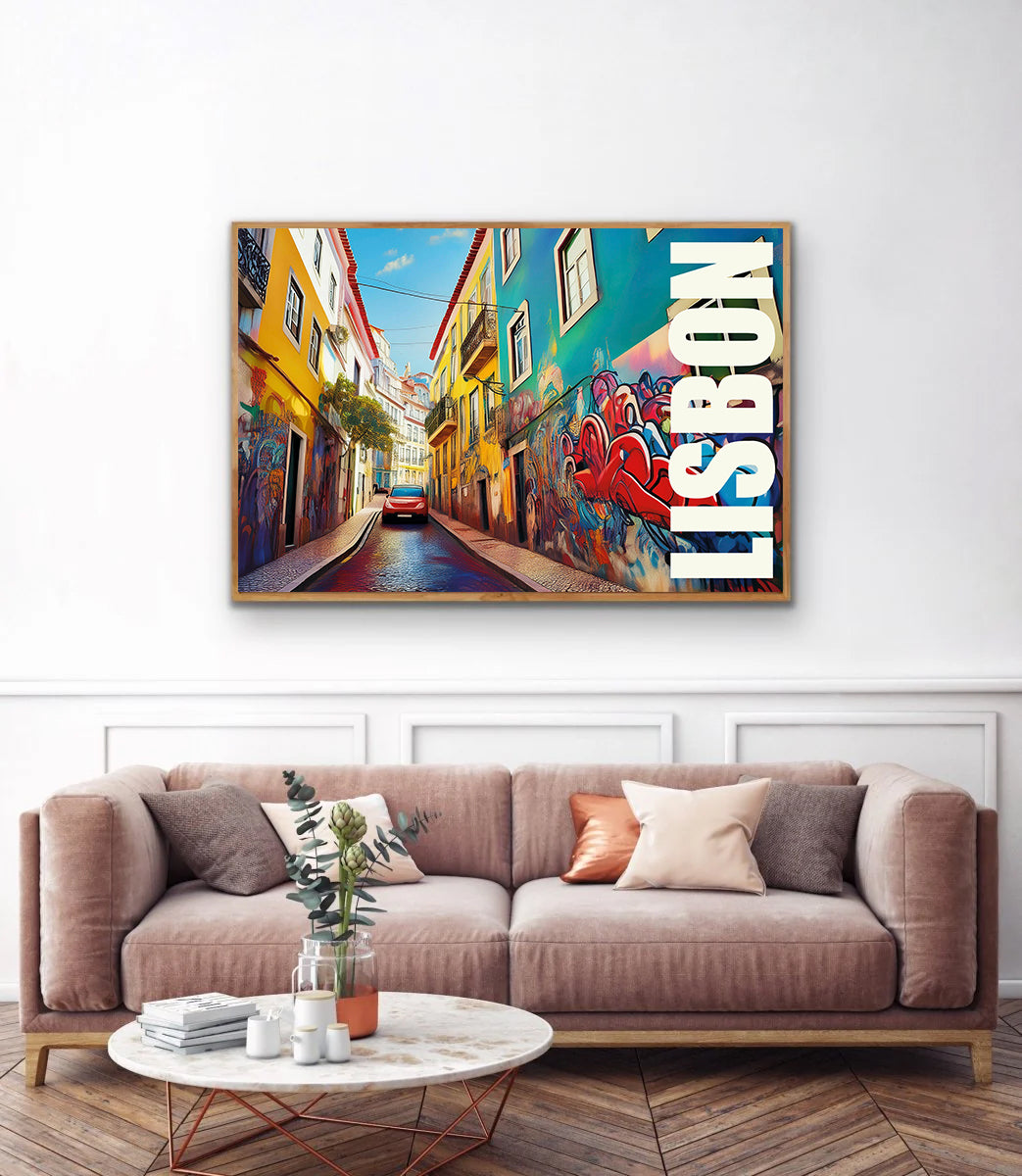 Framed artwork of a colorful street scene with 'Lisbon' on a wall above a sofa.