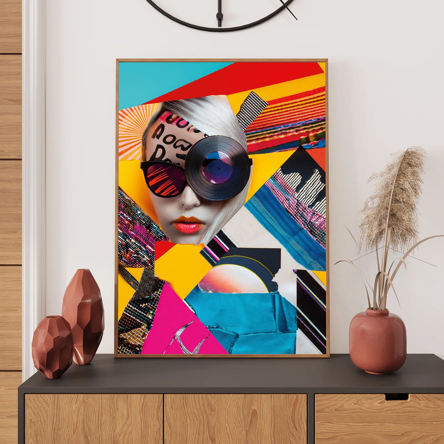 Colorful abstract art print on a wall above a wooden cabinet with decorative items.