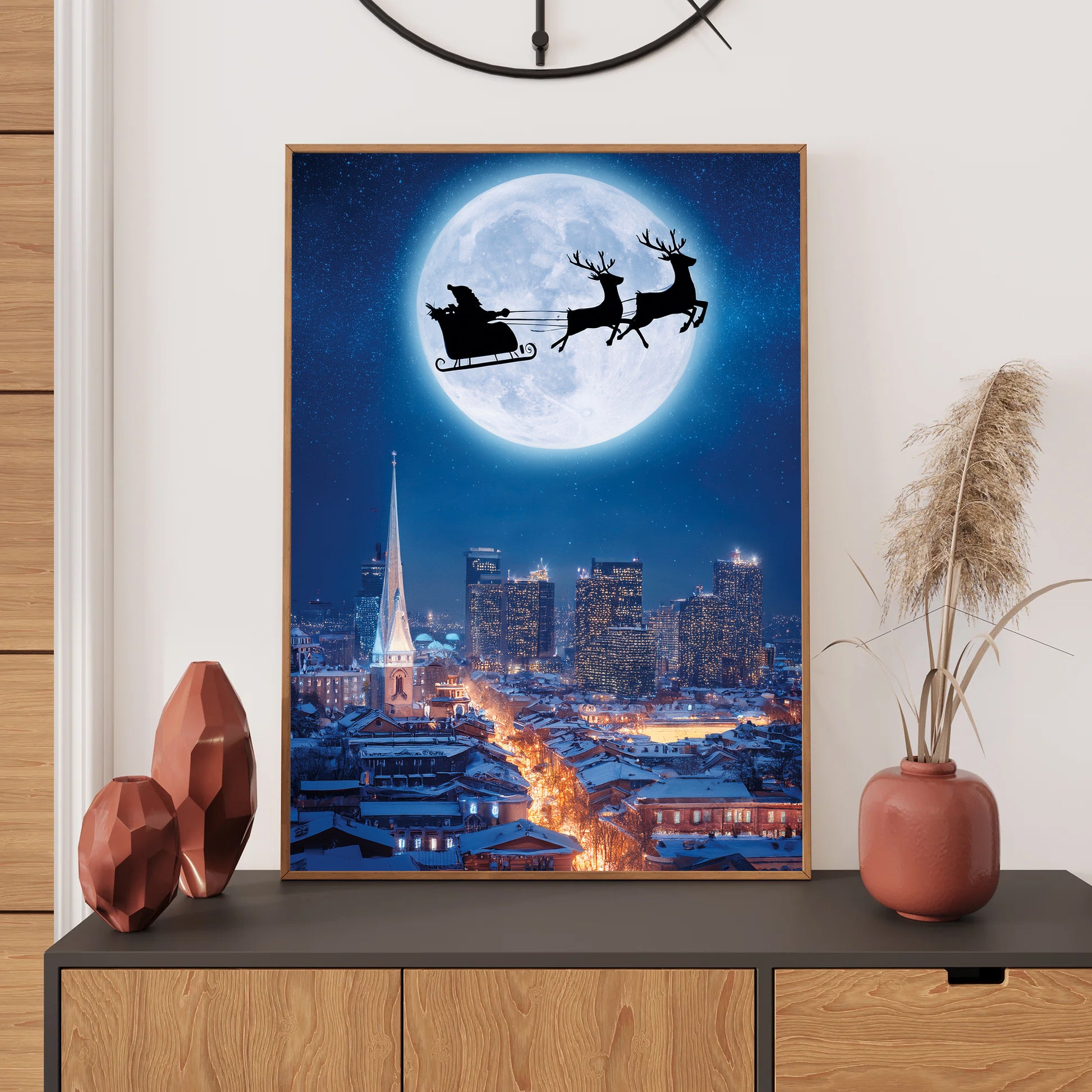 Santa Flying Over City Christmas Card – Santa’s sleigh flying across snowy city skyline under full moon