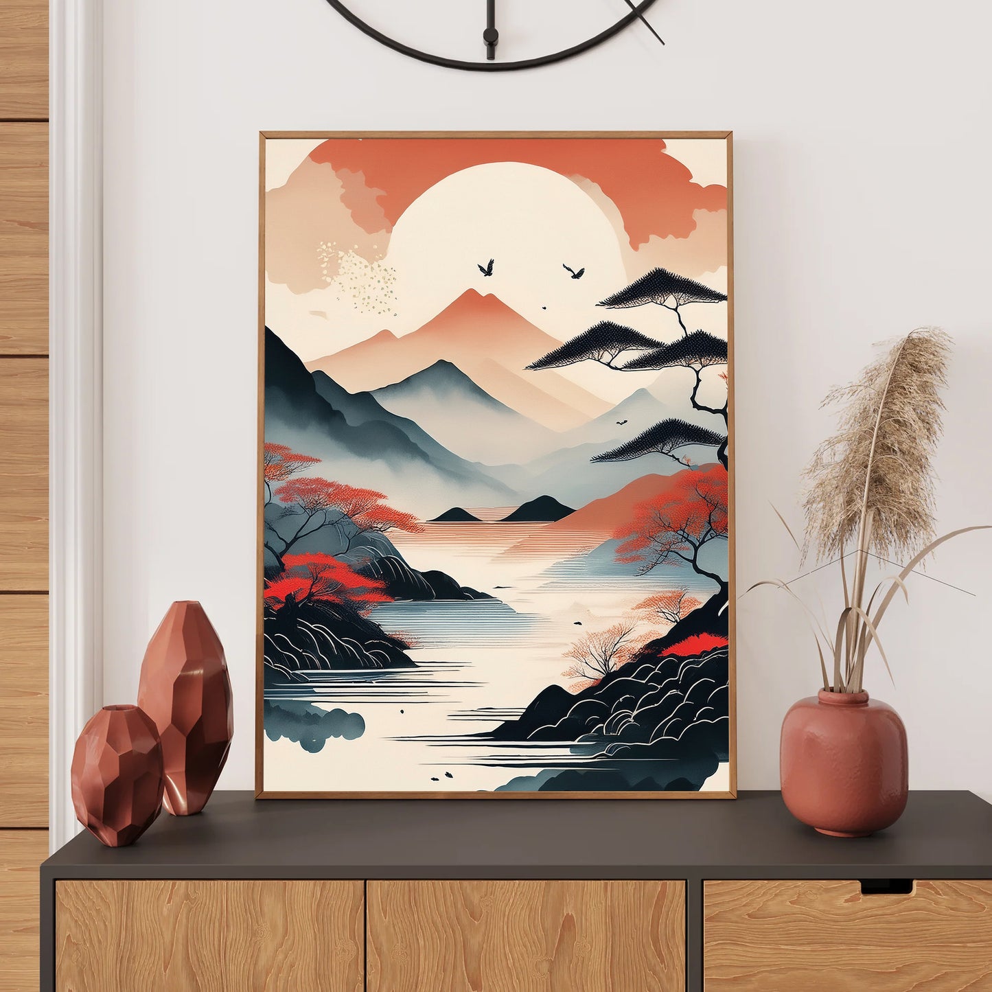 Framed artwork of a mountain landscape on a wall above a console table with decorative items.
