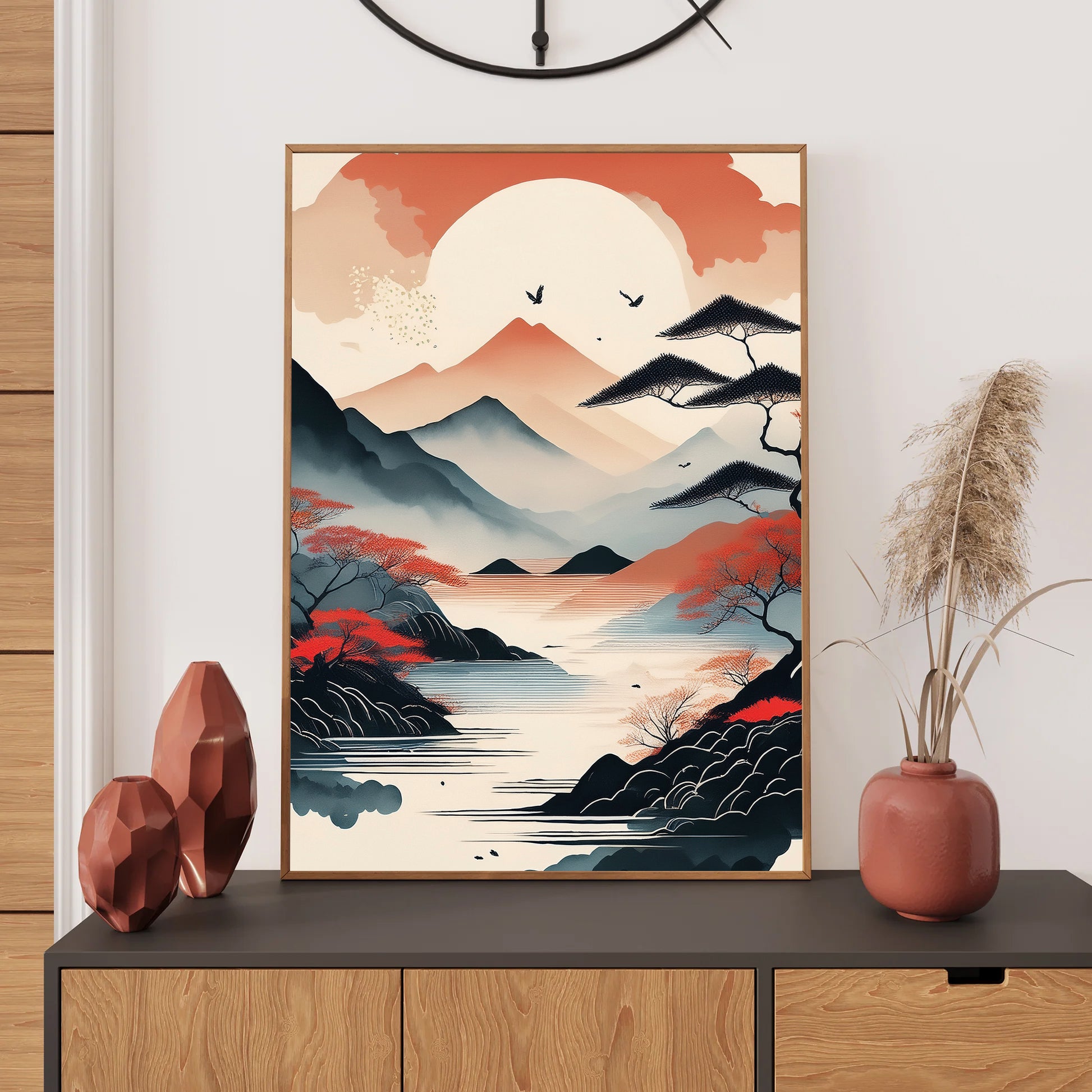Framed artwork of a mountain landscape on a wall above a console table with decorative items.